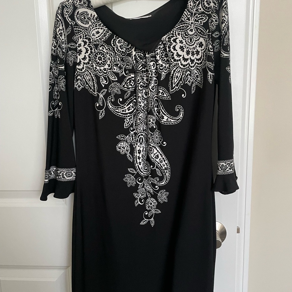 Dress, above the knee, flattering style, dressy or casual